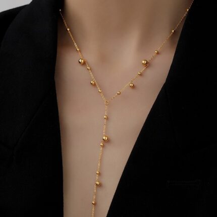 Collier de perles rondes en acier inoxydable plaqué or à 18 carats pour femmes